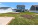 Backyard featuring green grass, a white fence, and an open-air gazebo at 43 Jonalker Ct, Clayton, NC 27520
