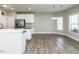 Bright kitchen with stainless steel appliances, granite countertops, and a dining area at 43 Jonalker Ct, Clayton, NC 27520