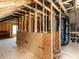 Unfinished attic with exposed wood framing and black insulated ductwork at 43 Jonalker Ct, Clayton, NC 27520