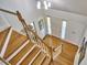 This home has a view of entryway featuring hardwood floors, staircase, and front door with sidelights at 4420 Dula St, Durham, NC 27705