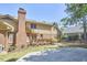 An exterior view of the home showing the back deck and well-maintained yard at 4420 Dula St, Durham, NC 27705