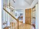 Hardwood floors lead from the front door to the home's staircase and office at 4420 Dula St, Durham, NC 27705
