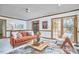 Open living room area with modern decor and plenty of natural light at 4420 Dula St, Durham, NC 27705