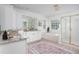 Bathroom with white cabinets, granite countertop, large tub and shower at 4913 Stockton Way, Durham, NC 27707