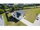A lovely home with a large backyard, a long driveway, and a detached storage shed at 50 Waterford Dr, Angier, NC 27501