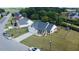 Aerial view of home featuring large yard and neighborhood at 50 Waterford Dr, Angier, NC 27501