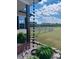 Beautifully landscaped backyard with rain chain at 50 Waterford Dr, Angier, NC 27501