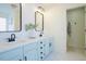 Double vanity bathroom with dual sinks and modern black fixtures at 50 Waterford Dr, Angier, NC 27501