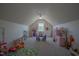 A delightful bonus room is perfect as a playroom, or home office space at 50 Waterford Dr, Angier, NC 27501