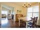Open-concept dining room view of the living room and abundance of natural light at 50 Waterford Dr, Angier, NC 27501