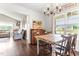 Inviting dining area featuring a vintage-style table and view into the living room at 50 Waterford Dr, Angier, NC 27501