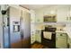 Bright kitchen features stainless steel appliances and ample cabinet space at 50 Waterford Dr, Angier, NC 27501