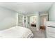 Bedroom with a plush bed, mirrored closet, and neutral tones, creating a peaceful retreat at 503 Gooseneck Drive # B4, Cary, NC 27513