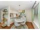 Bright dining area with a round table, modern chairs, and stylish light fixture at 503 Gooseneck Drive # B4, Cary, NC 27513