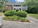 Charming two-story condo boasts a manicured lawn and a welcoming facade at 503 Gooseneck Drive # B4, Cary, NC 27513