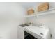 Bright laundry room with new washer and dryer and ample storage space at 503 Gooseneck Drive # B4, Cary, NC 27513