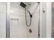 Modern tiled shower with a rainfall showerhead and a built-in niche at 503 Gooseneck Drive # B4, Cary, NC 27513