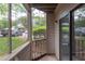 Covered balcony provides outdoor living space and views of the community parking area at 600 Audubon Lake Dr # 6B13, Durham, NC 27713