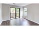 Sunlit patio with sliding glass doors offers outdoor living space at 600 Audubon Lake Dr # 6B13, Durham, NC 27713
