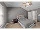 Serene bedroom featuring a neutral color palette, a ceiling fan, and cozy furnishings at 609 Woodson Dr, Clayton, NC 27527