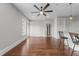 Spacious living room showcasing hardwood floors, natural light, and open floor plan at 700 Finsbury St # 105, Durham, NC 27703