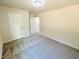 Bedroom featuring neutral carpeting and a door, creating a relaxing and inviting atmosphere at 71 Earnest Way, Kenly, NC 27542