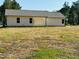 Exterior view of a home with a large, open backyard at 71 Earnest Way, Kenly, NC 27542