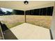 Covered patio with concrete flooring featuring a large open backyard, perfect for outdoor enjoyment at 71 Earnest Way, Kenly, NC 27542
