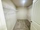 Spacious walk-in closet featuring wire shelving to maximize storage capabilities for organized living at 71 Earnest Way, Kenly, NC 27542