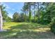 Spacious, grassy backyard is ready for outdoor activities and enjoyment at 7204 Bellweather N Ct, Raleigh, NC 27615