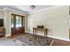 Inviting entryway with hardwood floors and decorative rug at 7204 Bellweather N Ct, Raleigh, NC 27615