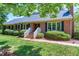 Charming brick home with manicured landscaping at 7204 Bellweather N Ct, Raleigh, NC 27615