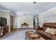 Cozy living room with a leather sofa at 7204 Bellweather N Ct, Raleigh, NC 27615