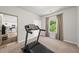 Home gym with a modern treadmill and access to kitchen at 77 Rolling Creek Cir, Clayton, NC 27520
