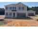 Charming two-story home with attached and detached garages on a spacious lot at 83 Sagamore Avenue, Angier, NC 27501