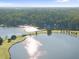 Beautiful aerial shot showcasing lakefront land with bridge at 9 Lakeview Dr, Sanford, NC 27332