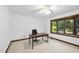 Sunlit bedroom with neutral carpet and bay window at 9 Lakeview Dr, Sanford, NC 27332