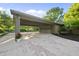Large driveway leads to carport with garage at 9 Lakeview Dr, Sanford, NC 27332