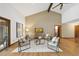 Vaulted living room with fireplace and vaulted ceiling provides a relaxing gathering space at 9 Lakeview Dr, Sanford, NC 27332