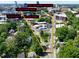 The aerial view outlines the neighborhood attractions, a home, and street in the area at 913 Washington St, Durham, NC 27701