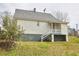 Exterior view of a charming home with siding and a grassy yard at 913 Washington St, Durham, NC 27701