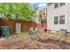 Cozy backyard with a wooden deck, perfect for relaxing or entertaining guests at 919 Lexington Ct, Cary, NC 27511