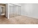 Bedroom with carpeted floors and a mirrored closet at 919 Lexington Ct, Cary, NC 27511