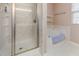 Bathroom featuring a separate shower and a relaxing tub, perfect for unwinding at 100 Full Moon Ct, Garner, NC 27529