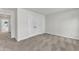 An empty bedroom with carpet, a double door closet, and neutral wall color at 1009 Rhino Bnd, Oxford, NC 27565