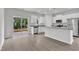 Modern kitchen with white cabinets, stainless steel appliances, and an island at 1009 Rhino Bnd, Oxford, NC 27565
