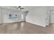 Bright living room with wood floors, white walls, and lots of natural light at 1009 Rhino Bnd, Oxford, NC 27565