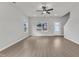 Spacious living room featuring hardwood floors, large windows, and an open layout at 1009 Rhino Bnd, Oxford, NC 27565