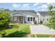 Relaxing backyard space featuring a screened porch and patio with a grill at 1009 Travern Dr, Raleigh, NC 27603