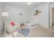 Charming bedroom featuring playful decor, soft lighting, and comfortable furnishings at 1009 Travern Dr, Raleigh, NC 27603